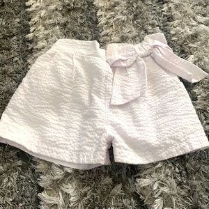 White ribbed shorts.